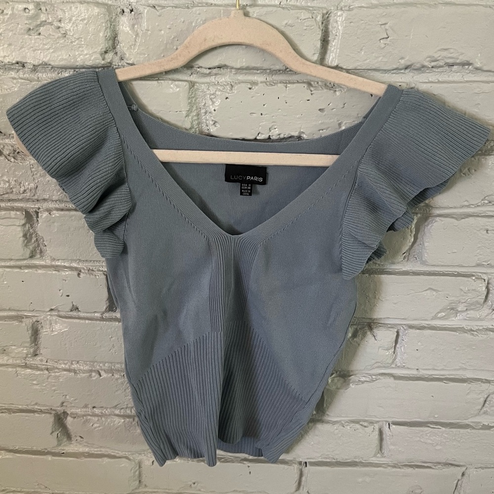 Lucy Paris sarah ruffle knit top with flutter sleeve and ribbed detail